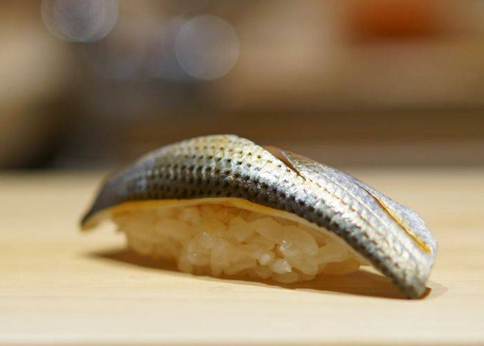 A delicate slice of fresh fish on vinegared rice at Gion Sushi Tadayasu.